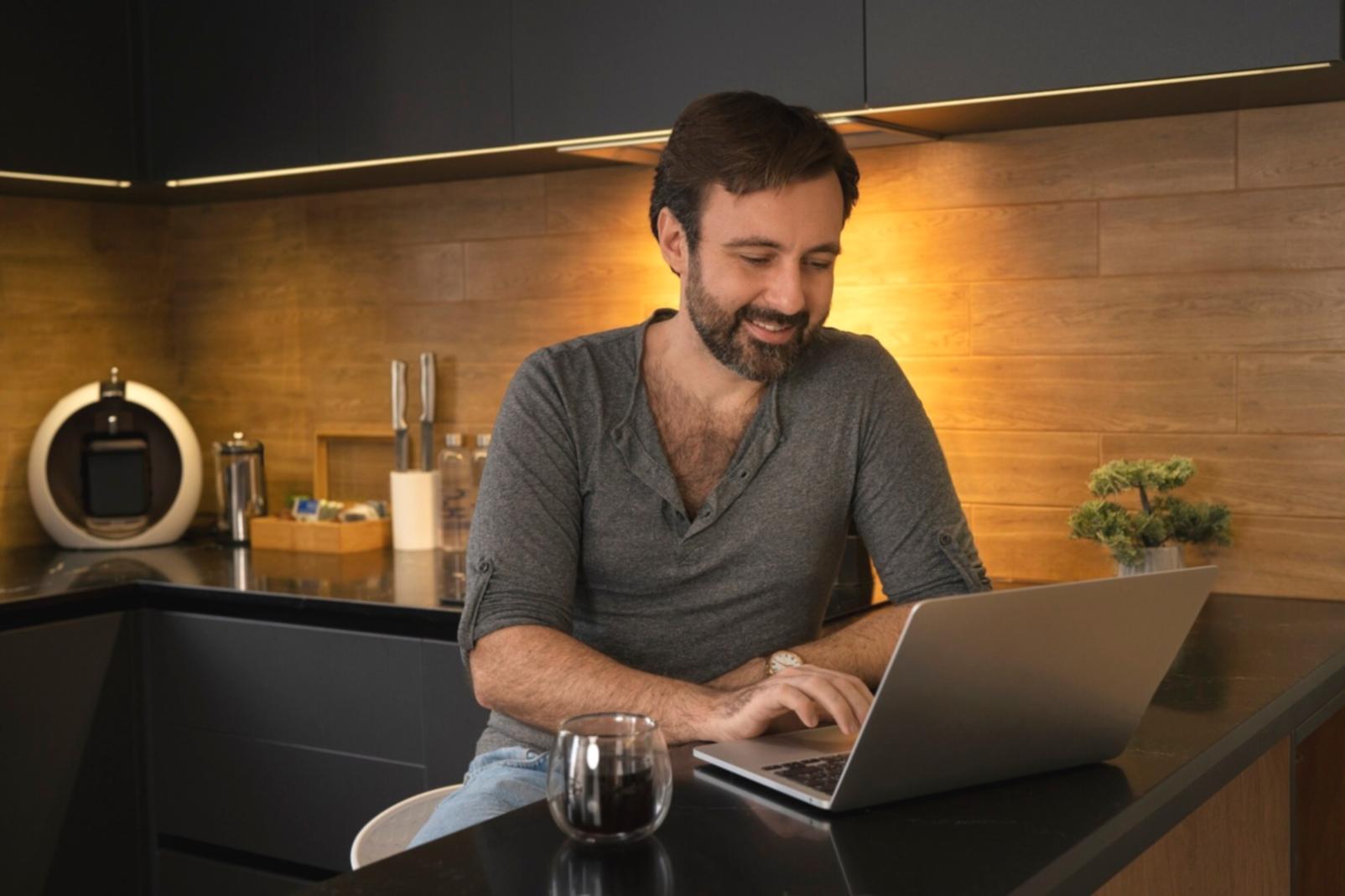 Students working on financial technology projects using modern computers and data analysis tools